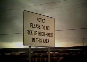 Please do not pick up hitch hikers in this area